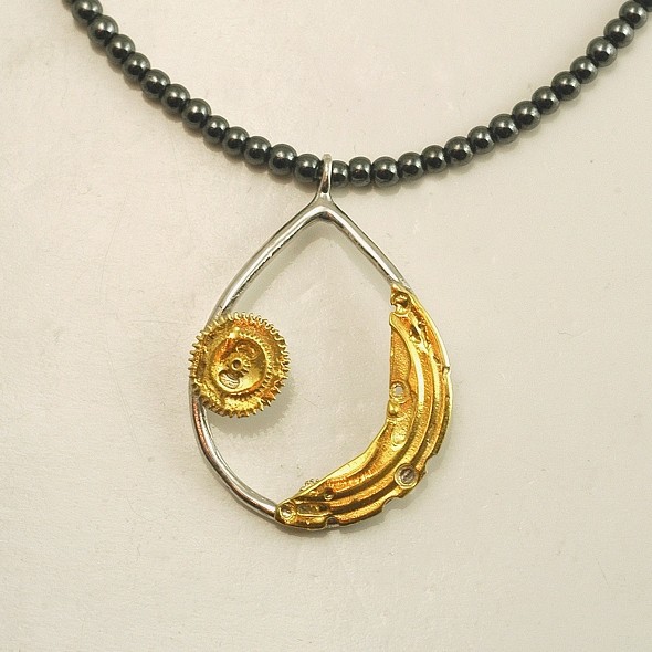 Silver pendant 925 rhodium and gold plated with synthetic stones