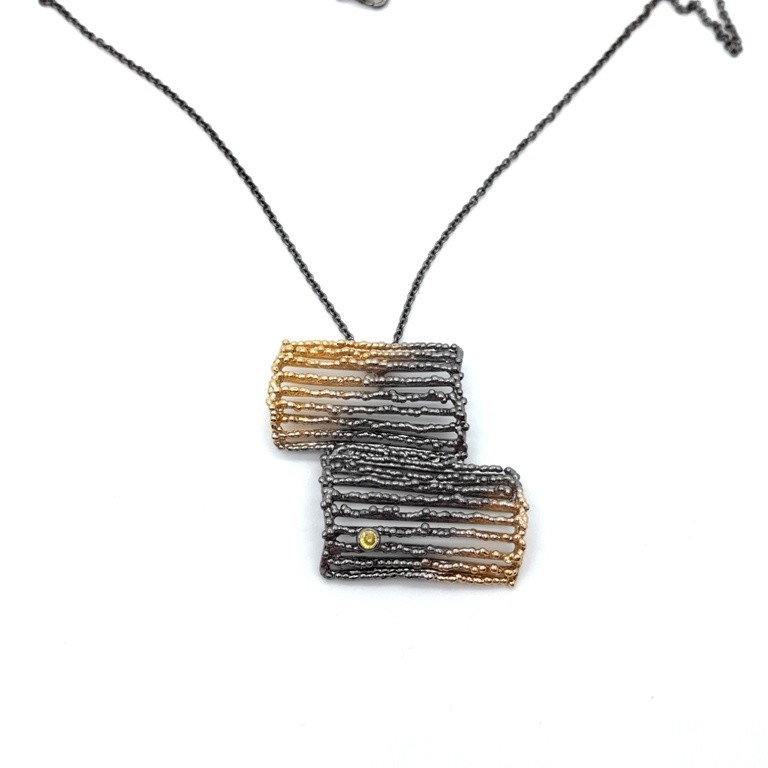Silver pendant 925 black rhodium and gold plated with synthetic stones