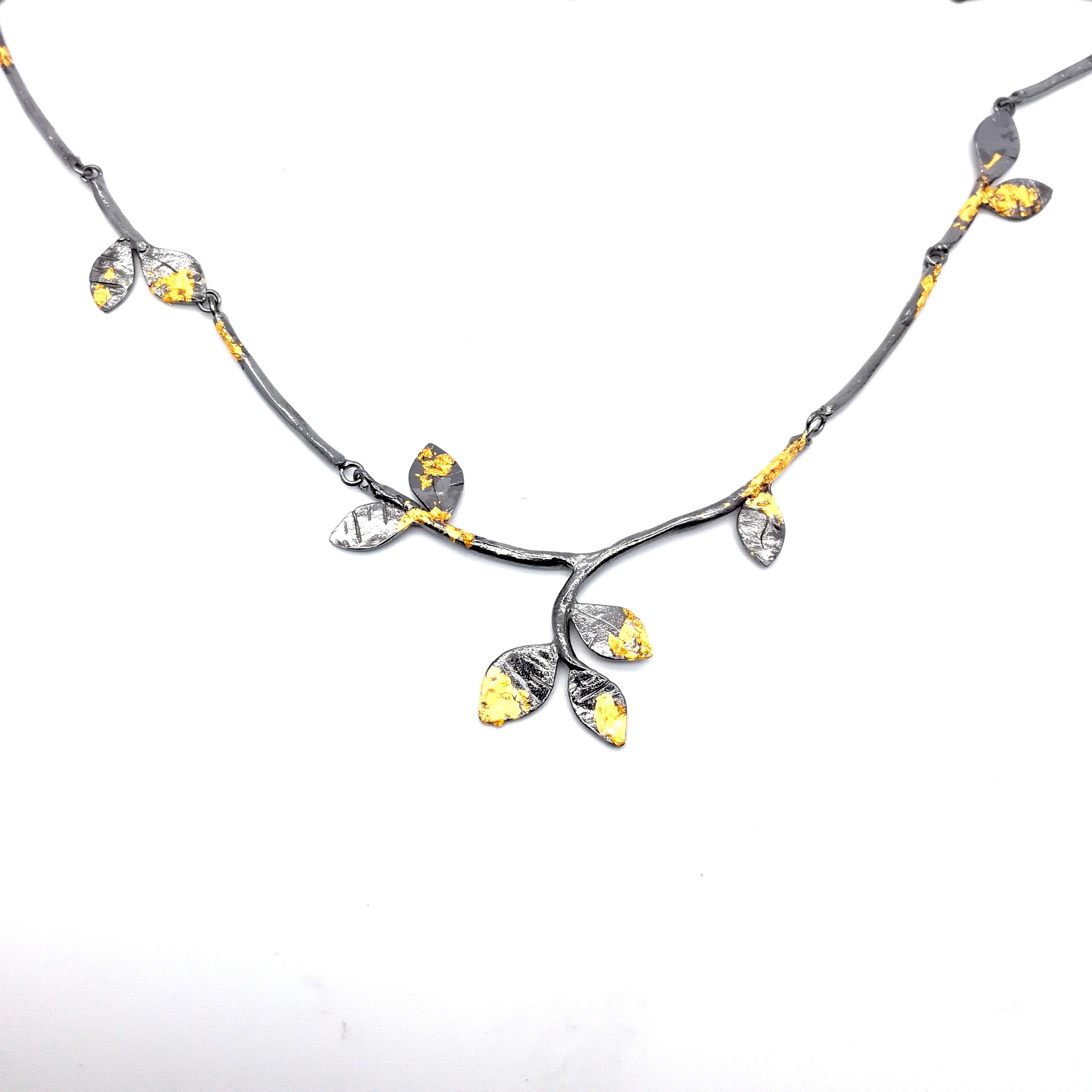 Silver necklace 925 black rhodium plated with resin and gold leaf 22K